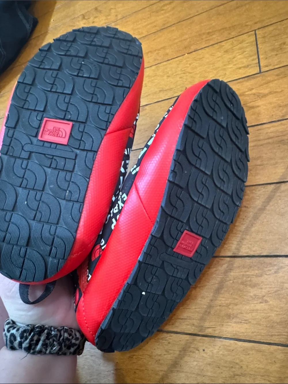 The North Face Men’s Quilted Slip-On Slippers in Black and Red
